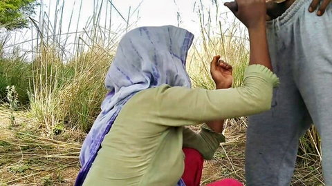 Hijabi Desi woman in green tunic gives outdoor handjob in POV threesome
