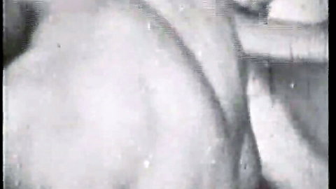 Retro black and white 8mm porn with small natural tits and fingering action