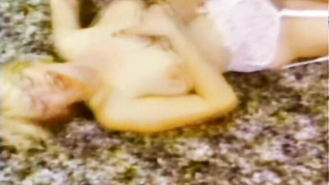 Elena DeSantis topless in white lingerie, vintage nude pose