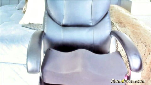 Busty Latina riding big dildo in chair, moaning loudly