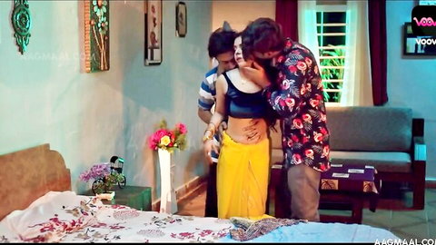 Indian curvy babe in yellow saree kissed passionately by two men, big breasts on display