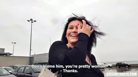 Smiling busty brunette flips off in car park, teasing married woman vibe