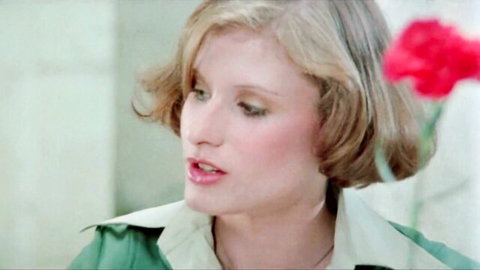 Vintage blonde MILF closeup with parted glossy lips and fair skin in retro scene