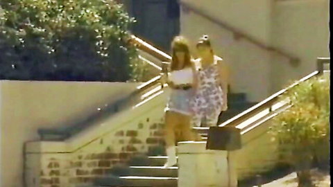 Vintage chubby lesbians in short dresses walking up stairs