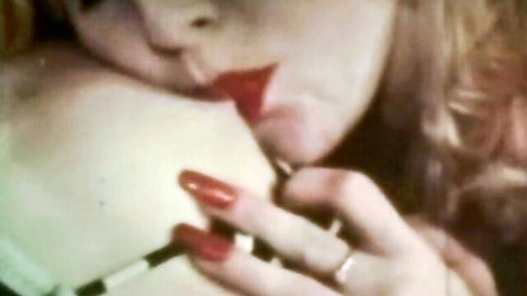 Desiree Lane kissing Tiffany Renee's breast in lesbian threesome