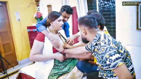 Three Indian men groping busty woman in red blouse green saree amateur gangbang tease