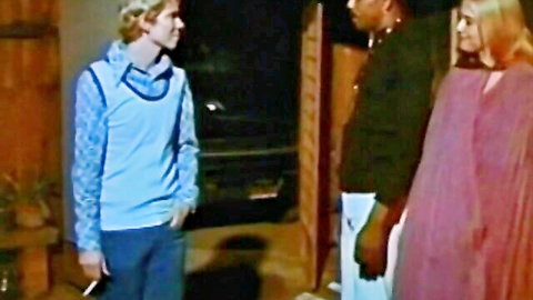 Vintage threesome thumbnail: blond guy, black man, blonde in pink dress outdoors