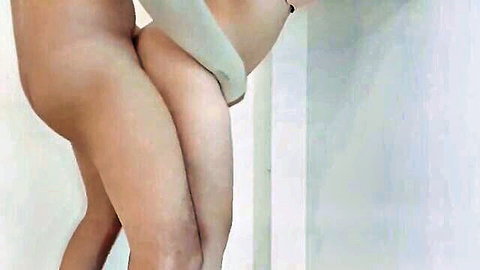 Thai couple in standing creampie with nude Asian woman bent over