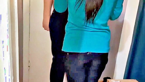 Two brunettes in teasing hug, lesbian courier tease in teal sweater