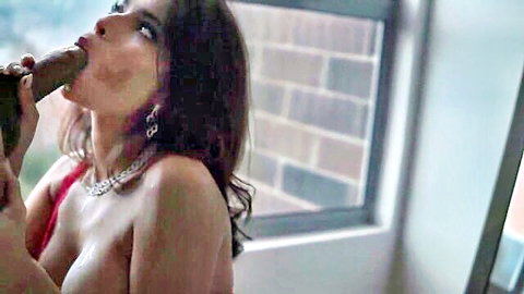 Latina with big tits sucking thick brown cock dildo passionately
