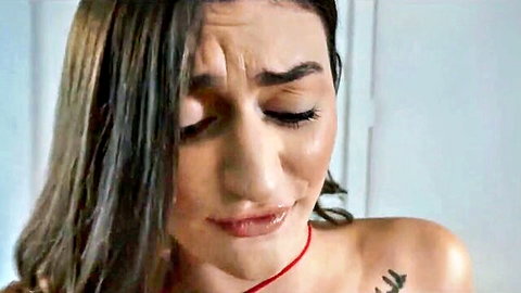 Mae Milano as step sister with distressed expression, red choker, bare shoulder tattoo