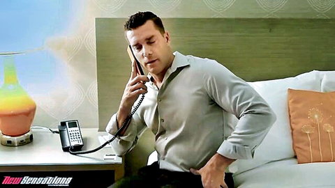 Man on phone in hotel room with Olivia Madison in steamy New Sensations encounter
