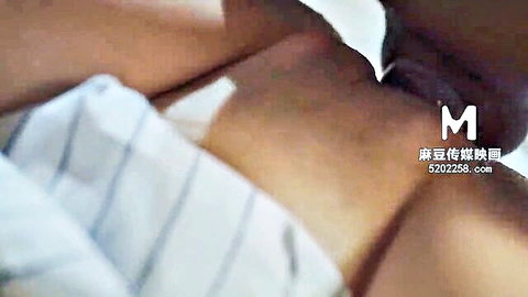 Curvy Asian woman's bare ass and back exposed in doggy style position on bed