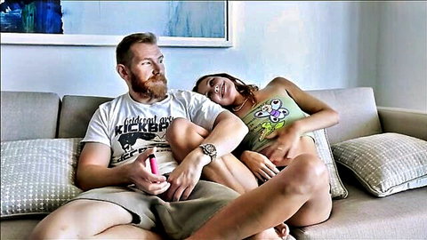 Stella Barey cuddles with bearded Alex Adams on couch in sexy crop top