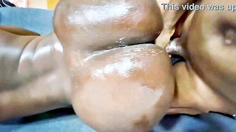 Ebony big ass spread wide with creamy cum dripping from wet pussy cheeks.