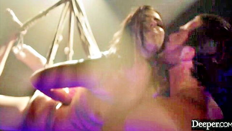 Brunette in BDSM rope swing passionately kisses bearded stud in intense bondage scene