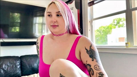 Skylar Vox with pink hair and tattoos in pink tank top, teasing POV