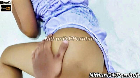 South Asian babe's shaved pussy and ass cheeks spread wide by man's hand from behind in lifted purple dress
