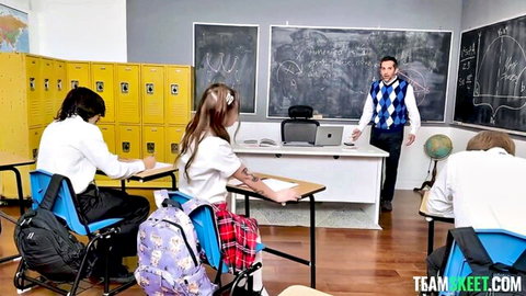 Trinity Olsen in schoolgirl uniform with teacher in classroom