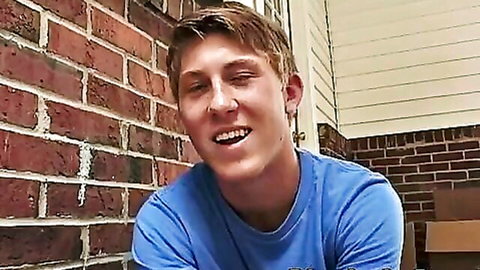 Hot young stud Mason Winters' partner smiling in blue tee, teasing handjob blowjob action