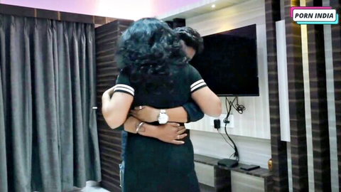 Busty Indian babes Krar and Milan embrace intimately in black dress