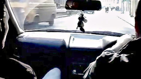 Girl teases driver's cock bulge with her foot in car while he drives