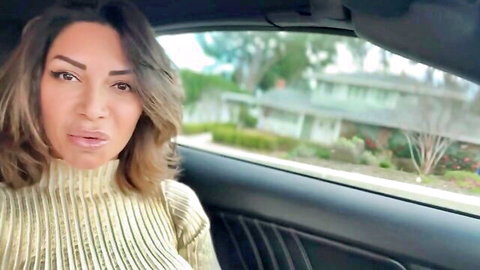 Vittoria in shiny gold turtleneck, seductive gaze in car, amateur kinky tease