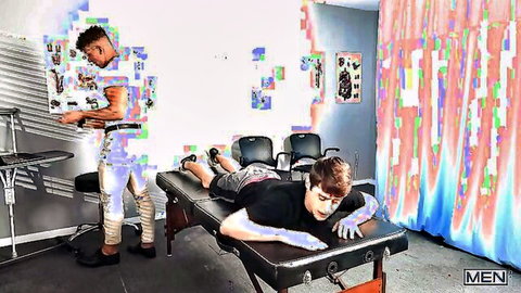 Joey Mills lies nude on table as Felix Fox massages him in doctor scene