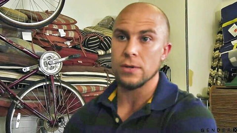 Bald muscular man in polo shirt, bike shop vibe, from blonde uniform BJ and anal video