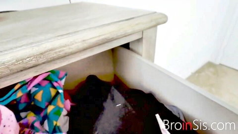 Cum-stained black panties and colorful lingerie overflowing from open bedroom drawer