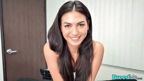 Brunette Megan smiling seductively, bare shoulders in creampie video