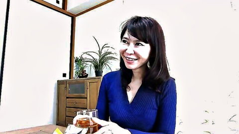 Japanese MILF Shiina smiling seductively in blue dress, holding drink