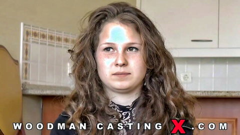 Curly haired amateur babe in Woodman casting interview with blue forehead sticker