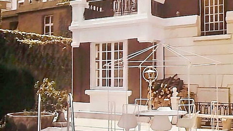 Elegant outdoor terrace from French adult film with slim busty couple