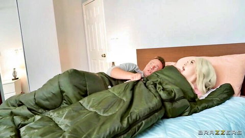 Kenzie Reeves in bed with Van Wylde under blanket, intimate threesome tease