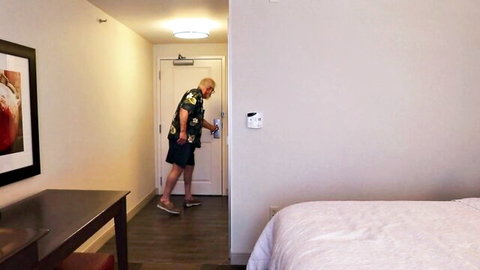 Christy in hotel room with older man in Hawaiian shirt for hot encounter
