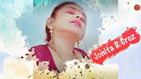 Seductive Indian MILF Jonita D Groz pouting lips in tight cleavage blouse