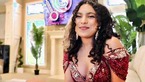 TheStartOfUs as Desi beauty in red off-shoulder dress with deep cleavage, smiling
