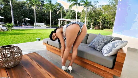 Harley Haze bends over showing off her ass in denim shorts and heels