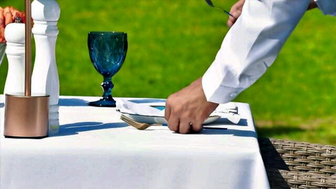 Brandi Love in elegant outdoor dining service setup