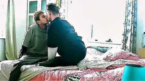 Two young men passionately kissing on bed, Ukrainian student seduction