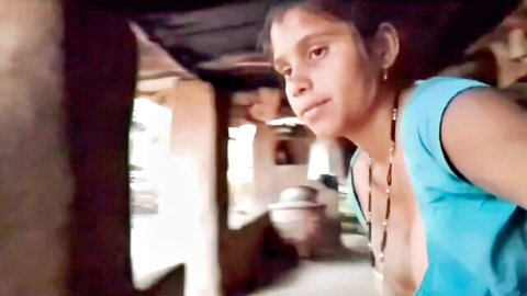 Indian woman in low-cut blue top with cleavage in naughty couple video