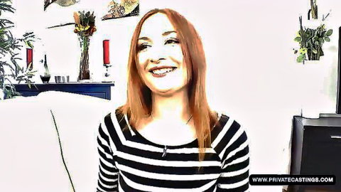 Eva Berger redhead smiling in striped shirt for casting audition