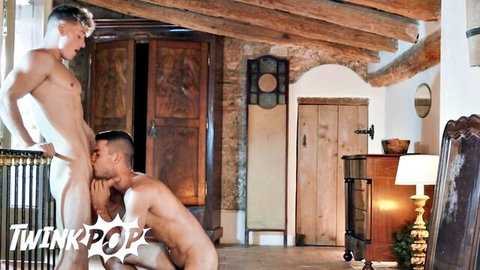 Felix Fox kneels to suck Bart Cuban's big cock in gay adult scene
