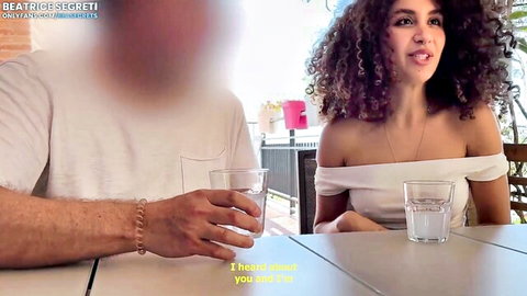 Beatrice Segreti flirts seductively in off-shoulder top on balcony