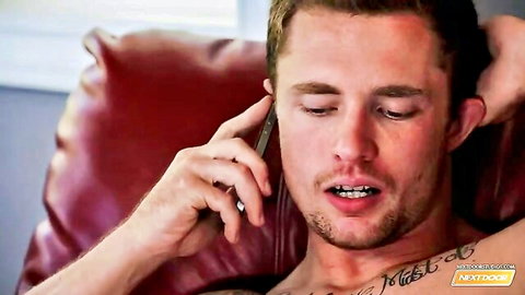 James Huntsman shirtless on phone, muscular build with tattoos in gay porn teaser