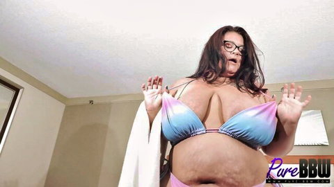 Raven Belle BBW in colorful bikini, teasing with huge tits and curves