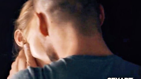 Casey Nohrman intimately embraces Angelo Godshack from behind