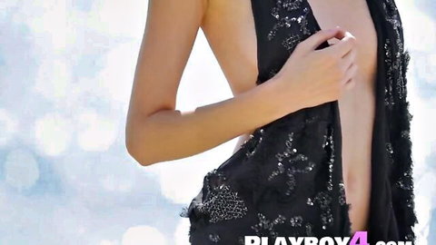 Sade Mare in open black sequined dress, flaunting fit body outdoors