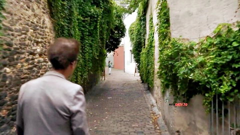 Conny Dachs in suit walks ivy alley in Julia Bach casting session